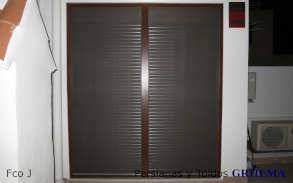 Mosquitera enrollable
