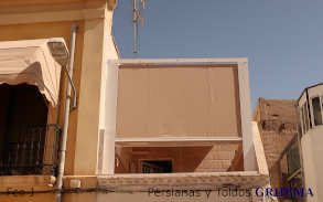 Toldo plano palilleria con quitavientos